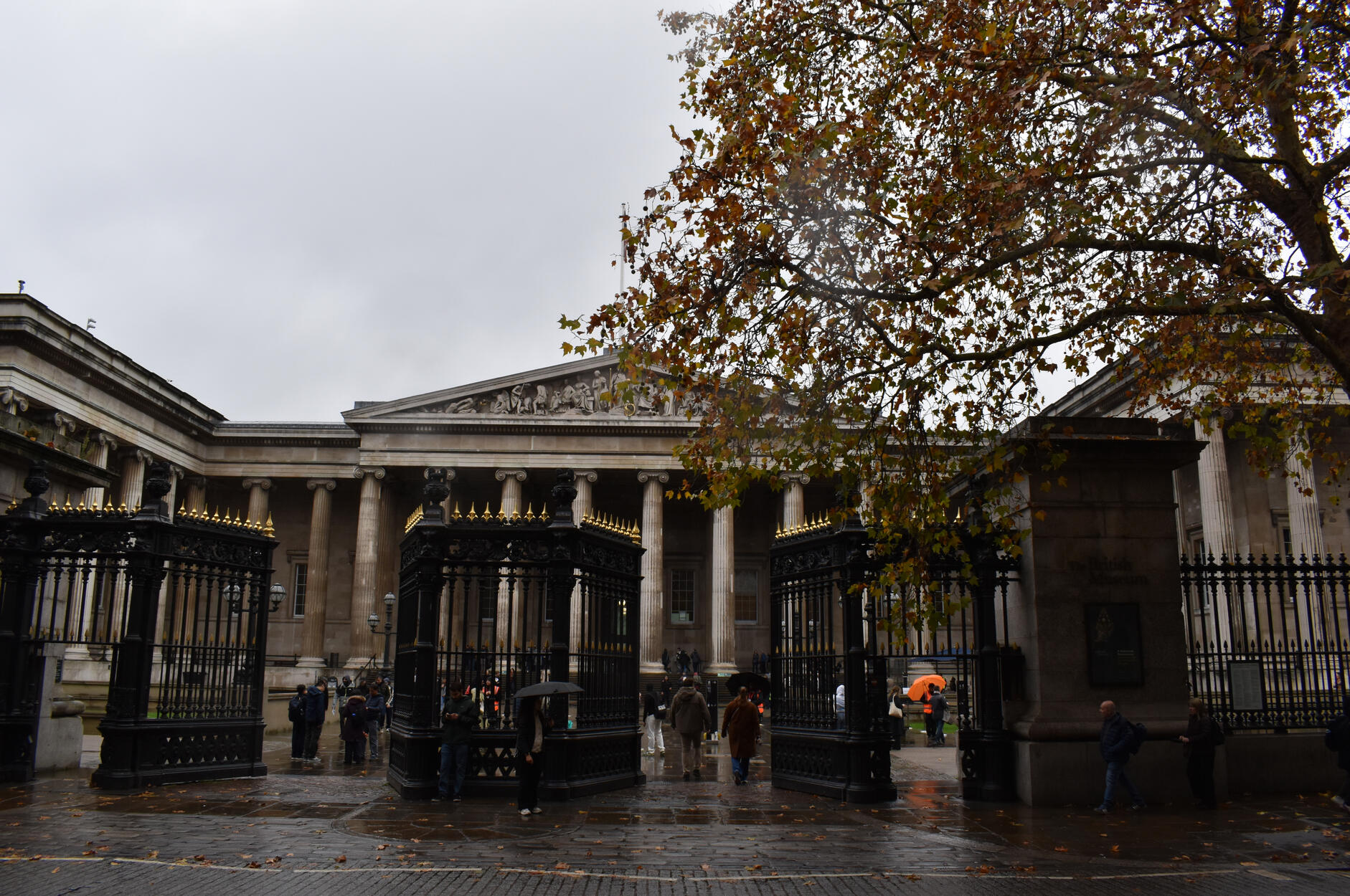 A photograph of the main entrance of the British Museum in the autumn.